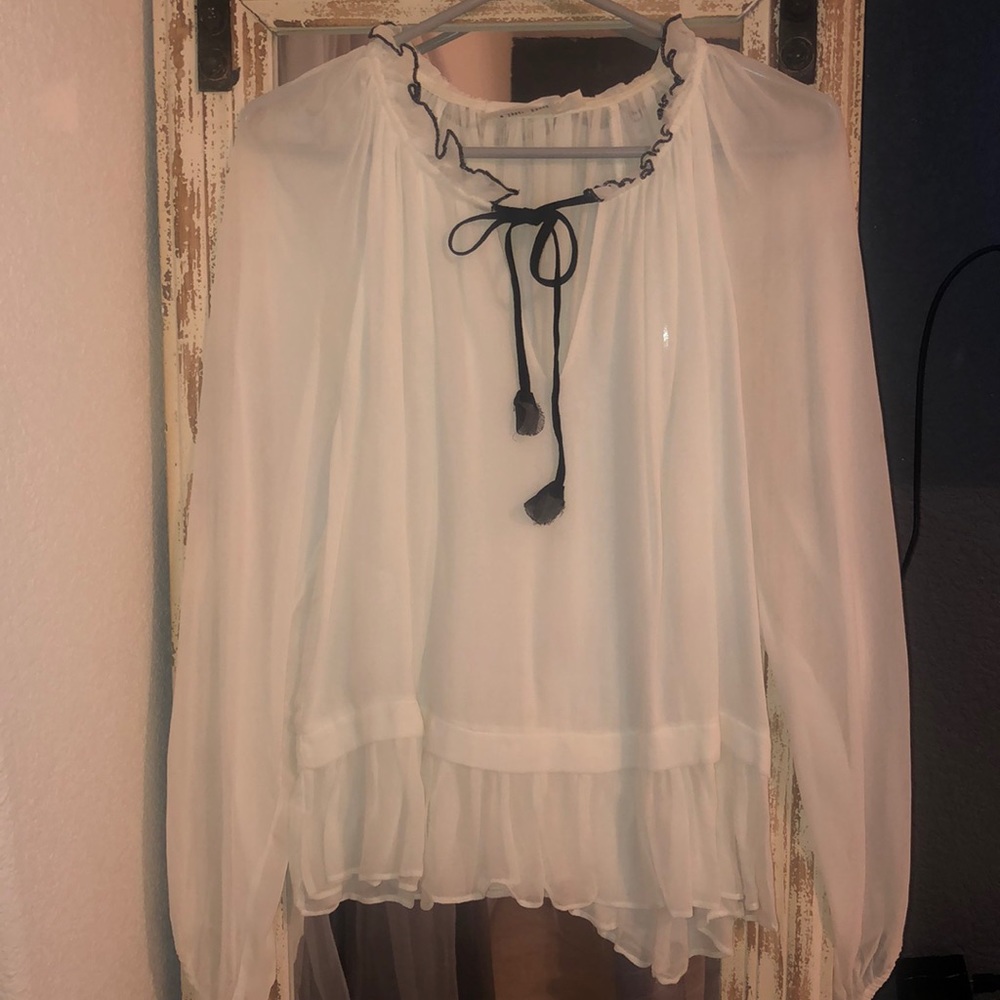 Line + Dot ruffle blouse